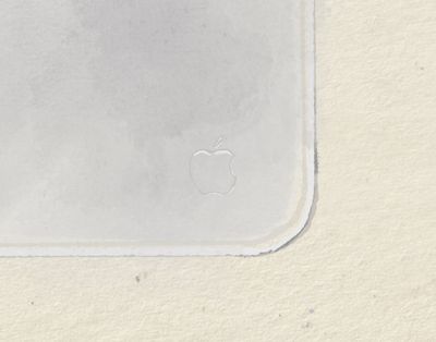 Detail: embossed Apple logo and microfiber surface texture