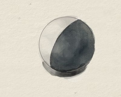The tracking ball, withdrawn from its retaining collar. A single rolling sphere carried the whole burden of cursor movement, and asked in return for periodic excavation of the dust it gathered off the desk. Optical sensing retired the mechanism in 2000.